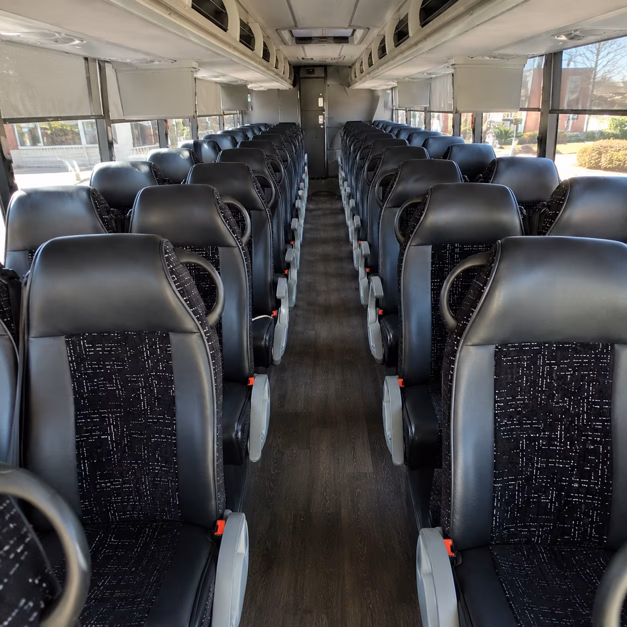 vista 54 passenger charter bus inside